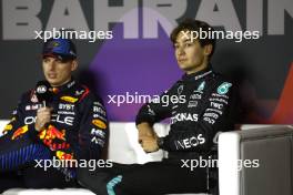 George Russell (GBR) Mercedes AMG F1 and Max Verstappen (NLD) Red Bull Racing in the post qualifying FIA Press Conference. 01.03.2024. Formula 1 World Championship, Rd 1, Bahrain Grand Prix, Sakhir, Bahrain, Qualifying Day.