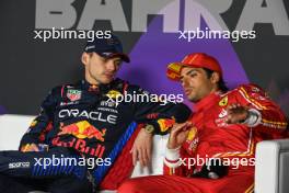 (L to R): Max Verstappen (NLD) Red Bull Racing and Carlos Sainz Jr (ESP) Ferrari in the post race FIA Press Conference. 02.03.2024. Formula 1 World Championship, Rd 1, Bahrain Grand Prix, Sakhir, Bahrain, Race Day.