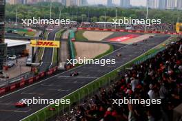 Max Verstappen (NLD) Red Bull Racing RB20 leads behind the Mercedes FIA Safety Car. 21.04.2024. Formula 1 World Championship, Rd 5, Chinese Grand Prix, Shanghai, China, Race Day.