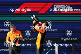 (L to R): Andrea Stella (ITA) McLaren Team Principal with race winner Lando Norris (GBR) McLaren on the podium. 05.05.2024. Formula 1 World Championship, Rd 6, Miami Grand Prix, Miami, Florida, USA, Race Day.