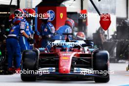 Charles Leclerc (MON) Ferrari SF-24 makes a pit stop. 05.05.2024. Formula 1 World Championship, Rd 6, Miami Grand Prix, Miami, Florida, USA, Race Day.