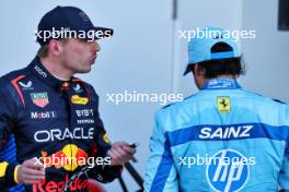 (L to R): Max Verstappen (NLD) Red Bull Racing with Carlos Sainz Jr (ESP) Ferrari in qualifying parc ferme. 04.05.2024. Formula 1 World Championship, Rd 6, Miami Grand Prix, Miami, Florida, USA, Sprint and Qualifying Day.