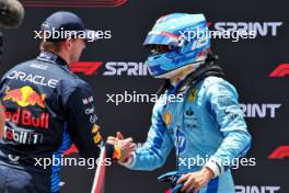 (L to R): Sprint winner Max Verstappen (NLD) Red Bull Racing with second placed Charles Leclerc (MON) Ferrari in parc ferme. 04.05.2024. Formula 1 World Championship, Rd 6, Miami Grand Prix, Miami, Florida, USA, Sprint and Qualifying Day.