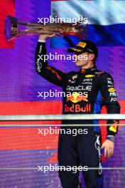Race winner Max Verstappen (NLD) Red Bull Racing celebrates on the podium. 09.03.2024. Formula 1 World Championship, Rd 2, Saudi Arabian Grand Prix, Jeddah, Saudi Arabia, Race Day.