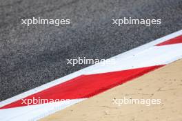 A kerb drain cover at turn 11. 22.02.2024. Formula 1 Testing, Sakhir, Bahrain, Day Two.