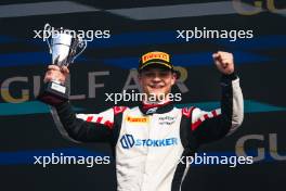 Paul Aron (EST) Hitech Pule-Eight celebrates his third position on the podium. 02.03.2024. FIA Formula 2 Championship, Rd 1, Feature Race, Sakhir, Bahrain, Saturday.