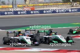 (L to R): Max Esterson (USA) Jenzer Motorsport and Charlie Wurz (AUT) Jenzer Motorsport battle for position. 02.03.2024. FIA Formula 3 Championship, Rd 1, Feature Race, Sakhir, Bahrain, Saturday.