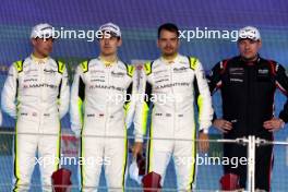 LMGT3 winners Aliaksandr Malykhin (KNA) / Joel Sturm (GER) / Klaus Bachler (AUT) #92 Manthey PureRxcing Porsche, celebrate on the podium. 02.03.2024. FIA World Endurance Championship, Round 1, Doha 1812 KM, Doha, Qatar, Saturday.